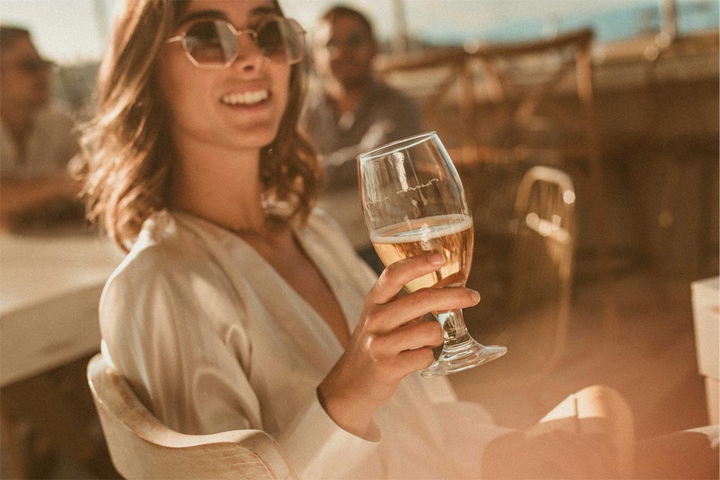 Colombian woman holding wine glass